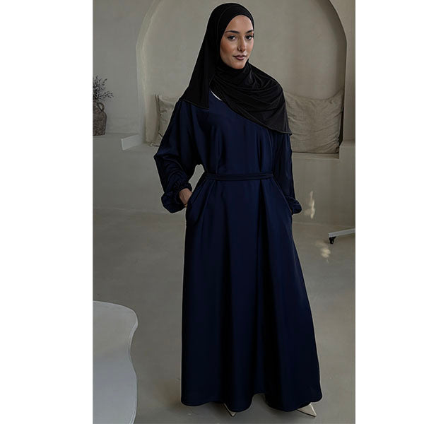A women wearing a Navy Shiny Metallic Type Satin Material Tiktok fabric A -Line Cut Abaya  with Zip Pockets and Belt Size 52 